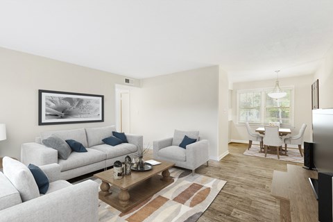 a living room with couches and a coffee table